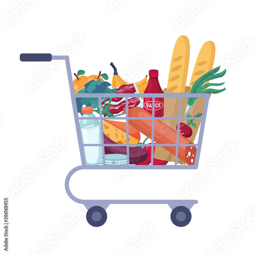 Full shopping cart with store groceries isolated trolley full of food. Vector grocery, butchery and dairy products flat cartoon. Meat and cheese, fruits and vegetables, sauce and canned fish, sausages