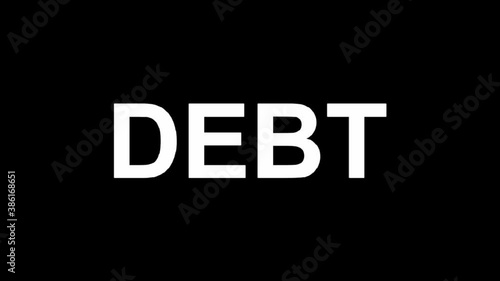 The word debt crumbles into small particles and disappears as a symbol of getting rid of debt photo