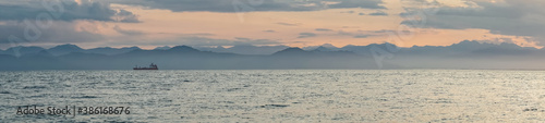 Kamchatka. panorama Sunset on Avacha Bay with a ship on the horizon. Petropavlovsk Kamchatsky.