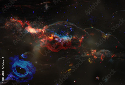Nebula over colorful stars and cloud fields in outer space. Abstract space wallpaper. Elements of this image furnished by NASA.