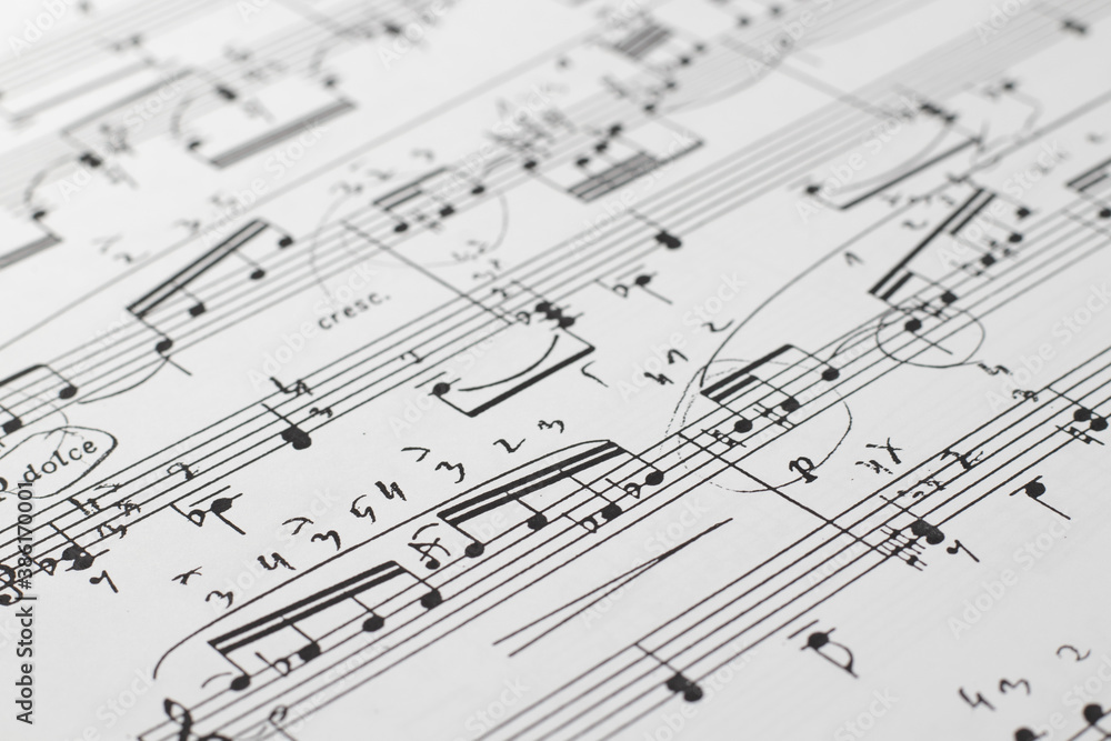 Fototapeta premium music notes background. Music sheet background, side view