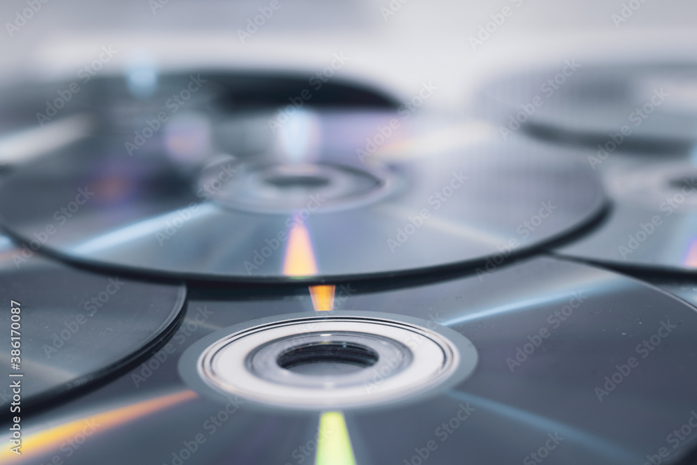 CD' DVD on white background. Pile of DVD compact disks CD' DVD on white background. Pile of DVD compact disks