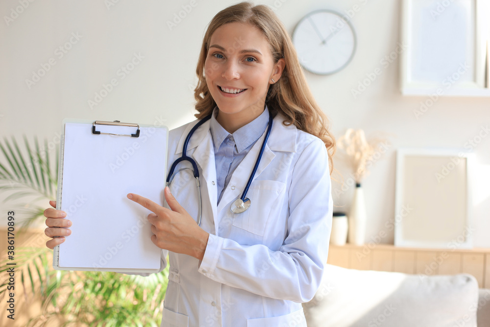 Happy smiling female doctor in white uniform coat and stethoscope. Happy smiling female doctor in white uniform coat and stethoscope.