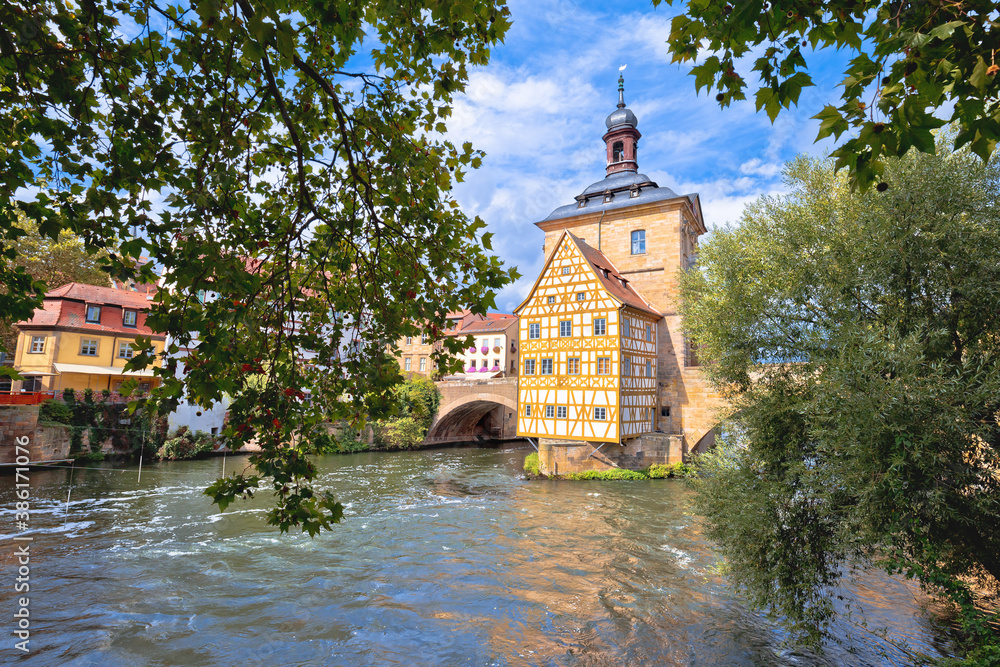 Fototapeta premium Bamberg. Scenic view of Old Town Hall of Bamberg (Altes Rathaus) with two bridges over the Regnitz river