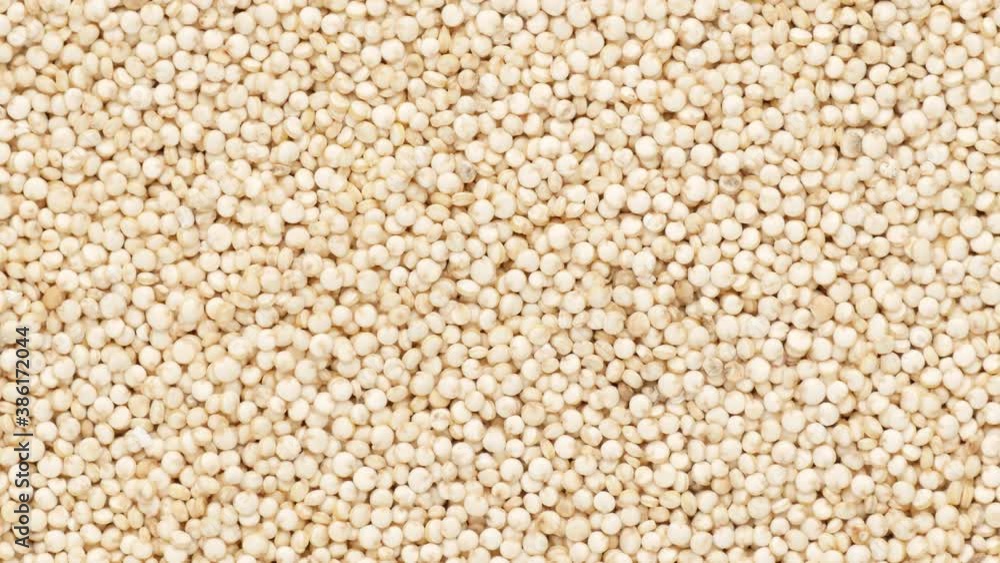 Quinoa groats, rotation. Groats - background. Quinoa groats, rotation. Groats - background.