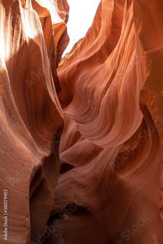 Sinuous sandstone layers in Antelope Canyon, narrow walls in a cave