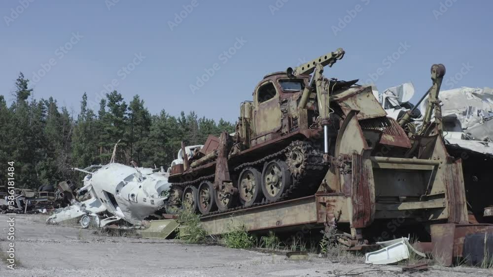 Video from the drone. Equipment cemetery in the village of Buryakovka. Radioactive transport that participated in the liquidation of the Chernobyl accident. Remains of burial equipment. Video from the drone. Equipment cemetery in the village of Buryakovka. Radioactive transport that participated in the liquidation of the Chernobyl accident. Remains of burial equipment.