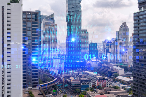 World planet Earth map hologram over panorama city view of Bangkok  Asia. The concept of international connections and business. Multi Exposure.