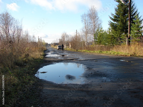 asphalt and puddles in the village