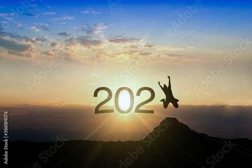 Happy people jumping up to sky 2021 new year