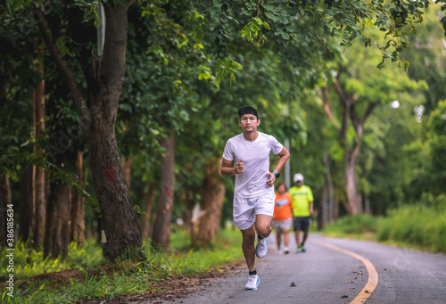 Asian men jogging and running in the park