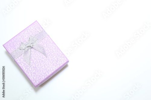 purple opened gift box isolated on white