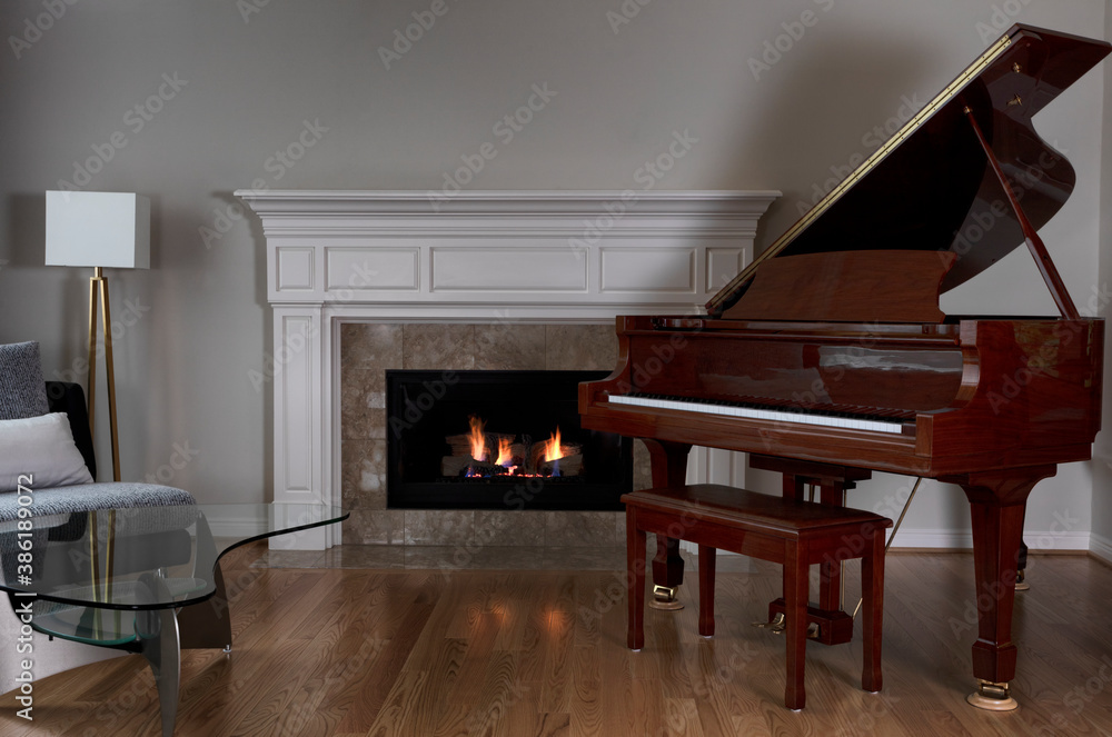 © tab62 - Glowing fireplace with baby grand piano on red oak floors © tab62 - Glowing fireplace with baby grand piano on red oak floors