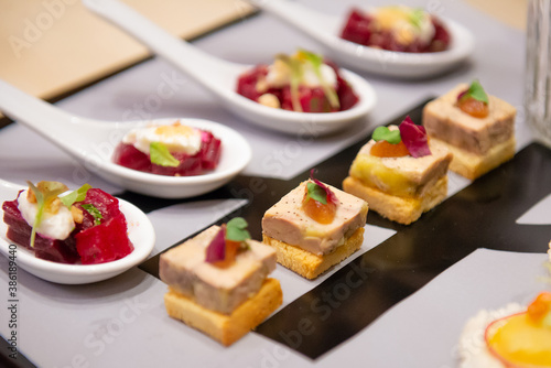 assorted dessert canape on slate plater