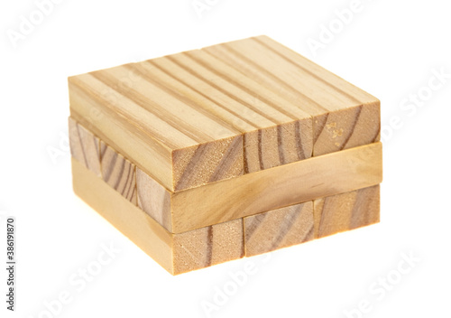 Stack wooden blocks  isolated on a white background. Wooden Blocks disrupted and building on white background