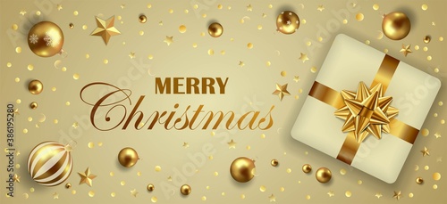 Golden christmas banner with gift, bow, stars, confetti and christmas balls