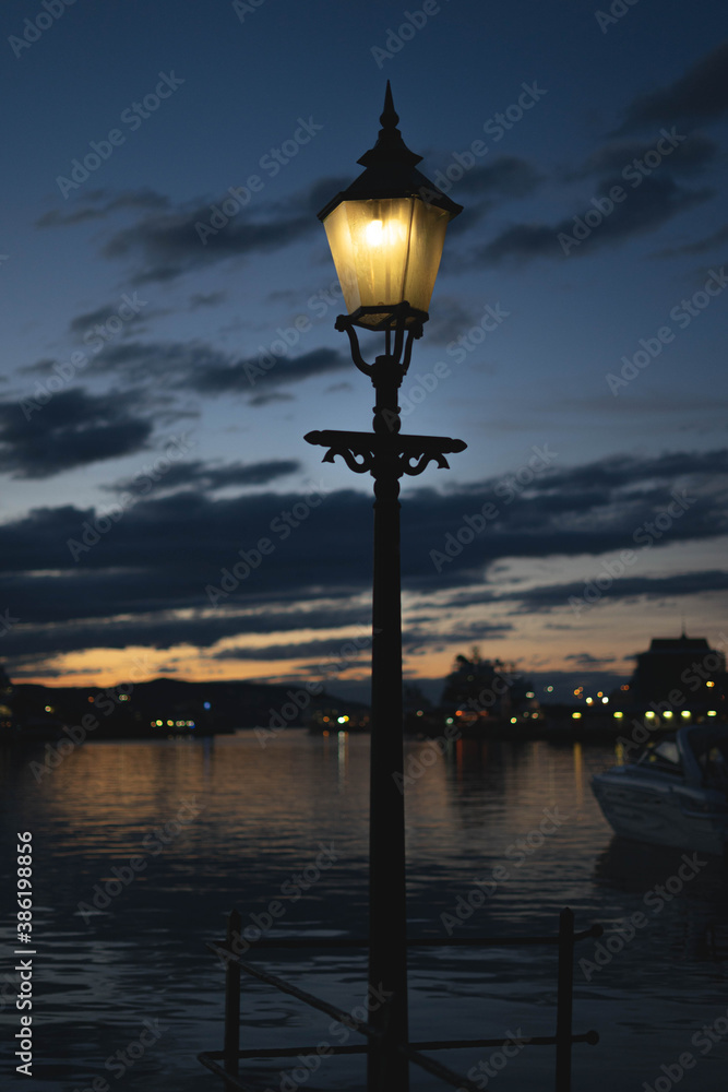 pier lamppost with beautiful sky