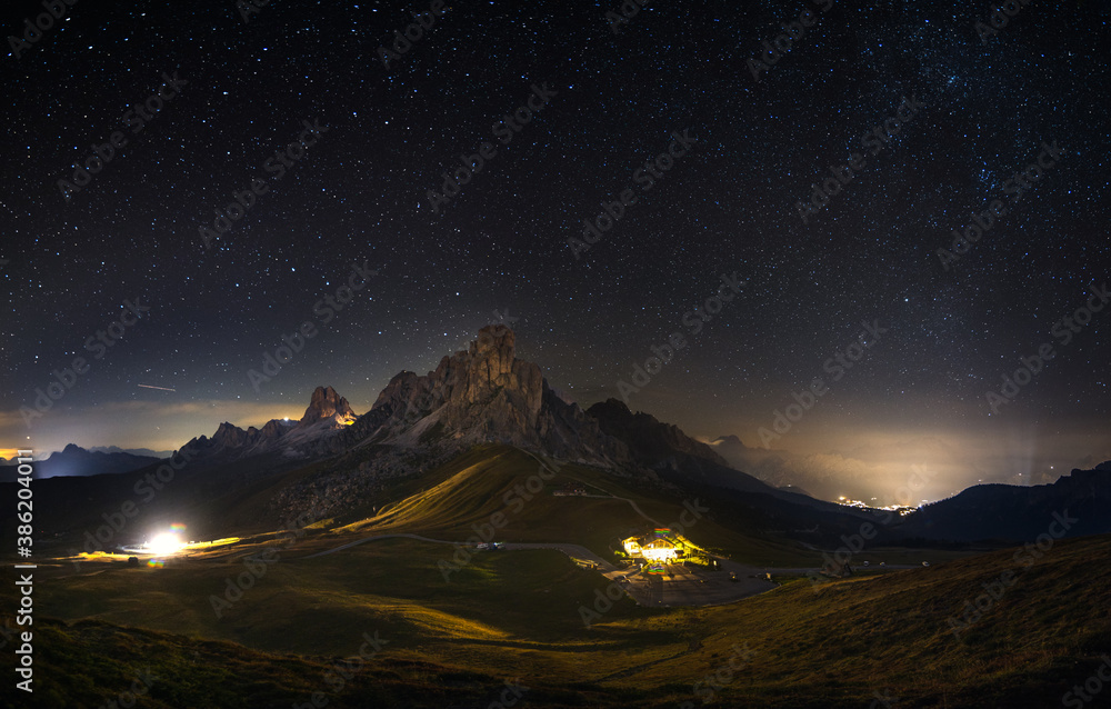 Passo Giau and Mount Nuvolau and Averau under a sky full of stars in Cortina D'ampezzo, famous ski resort in the Dolomites