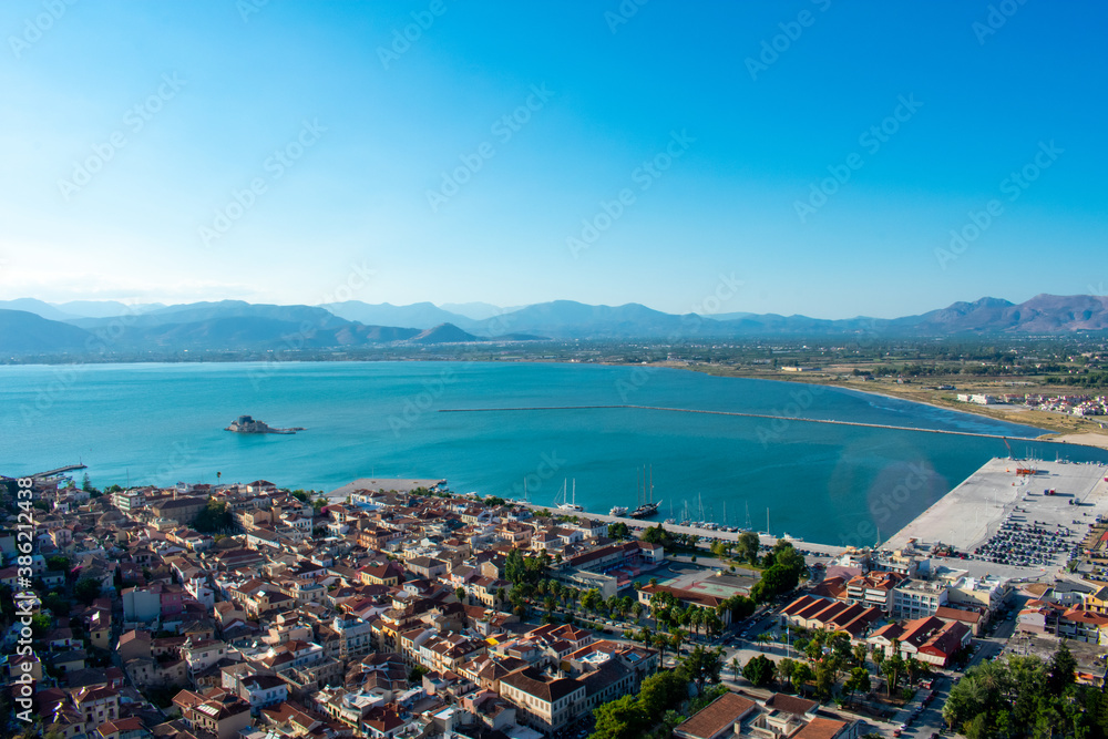 Aerial panoramic view of Napflio, Greece from Palamidi fortress. Seaport town in the Peloponnese peninsula Aerial panoramic view of Napflio, Greece from Palamidi fortress. Seaport town in the Peloponnese peninsula