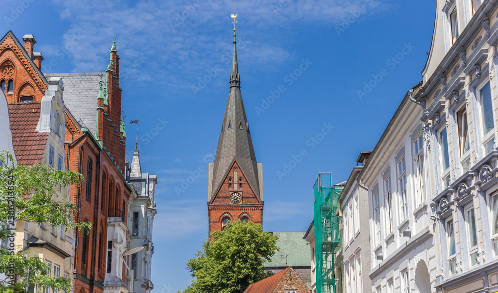Church tower and historic facades in Flensburg, Germany