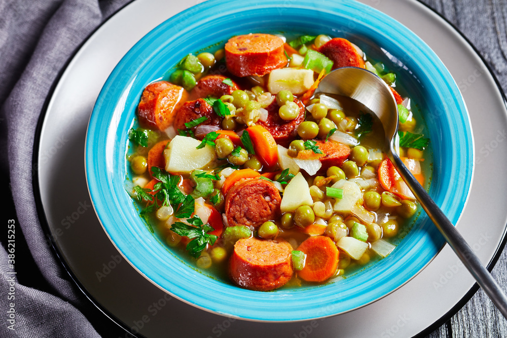 German split pea soup with sausage on a plate German split pea soup with sausage on a plate