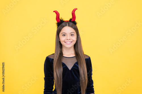 happy witch devil child wear imp horns costume on halloween party, halloween costume