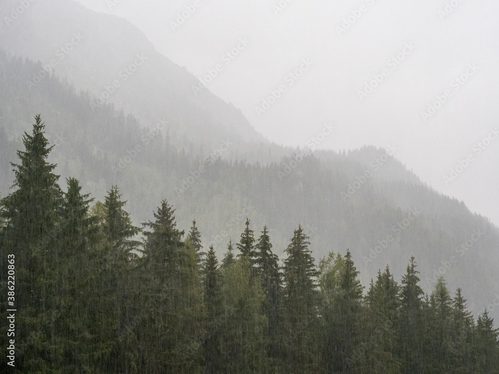 Fototapeta premium Heavy rain over the mountains, near city of Argentière, France. Beautiful for large prints! 