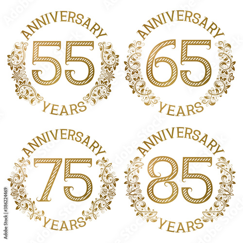 Set of golden anniversary emblems. Fifty fifth, sixty fifth, seventy fifth, eighty fifth years signs in vintage style.