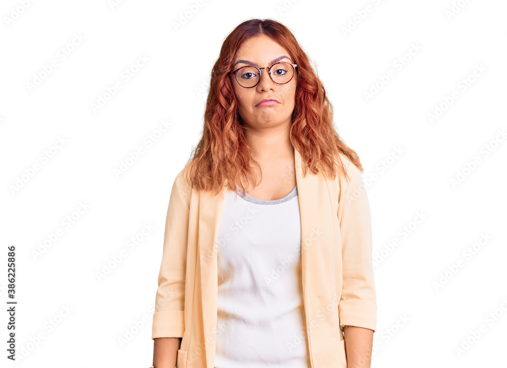 Young latin woman wearing business clothes depressed and worry for distress, crying angry and afraid. sad expression. Young latin woman wearing business clothes depressed and worry for distress, crying angry and afraid. sad expression.