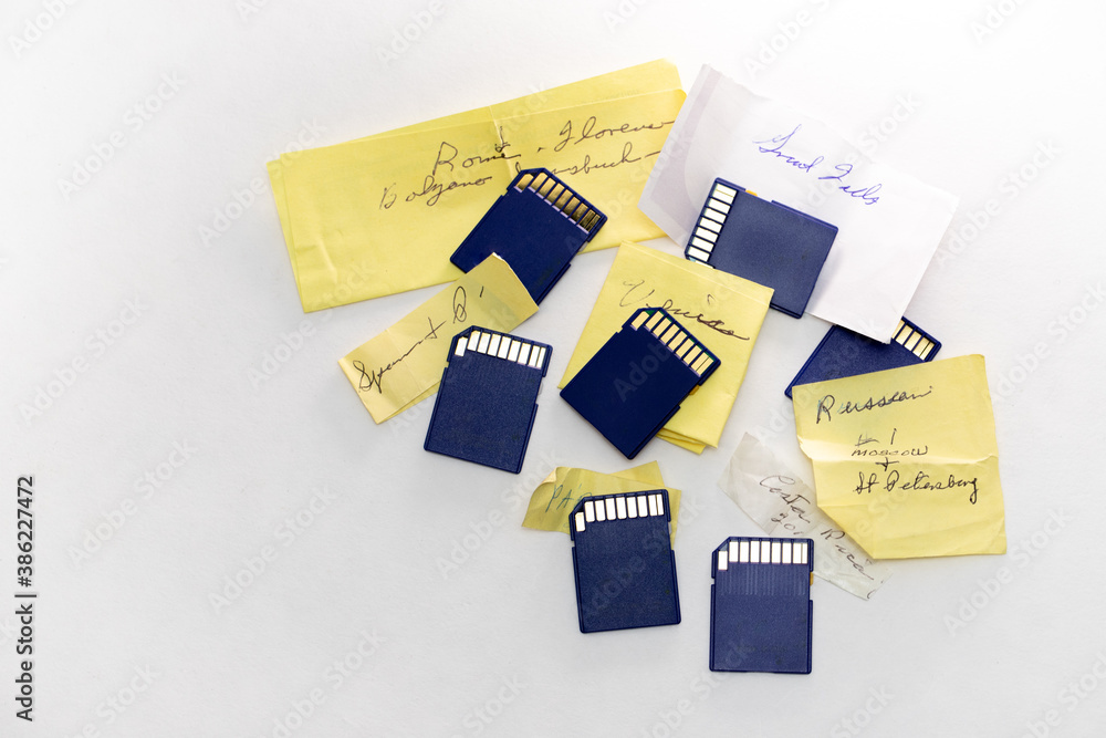 Photographs on Memory Cards Marked With Various Travel Destinations Photographs on Memory Cards Marked With Various Travel Destinations