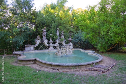 A fountain at Villa Sciarra city park of Rome in the autumn 