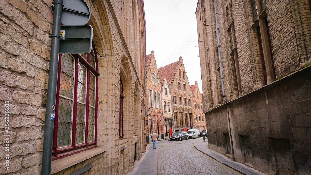 Bruges, Belgium - May 12, 2018: View to Empty street Steenstraat Quarter