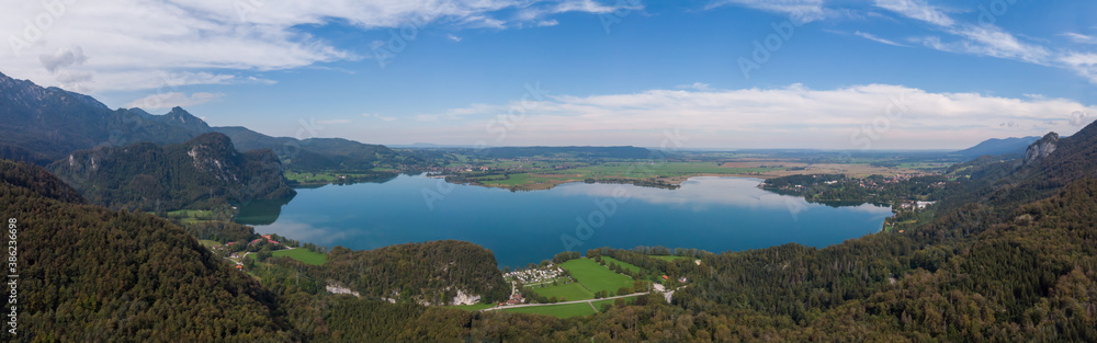 Aerial view of lake kochel with blue sky in the background