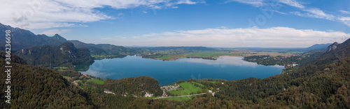 Aerial view of lake kochel with blue sky in the background