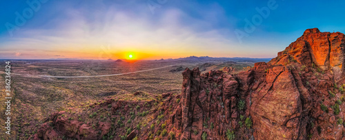 Mount McDowell rises over the valley as the sun sets over Phoenix, Arizona. photo