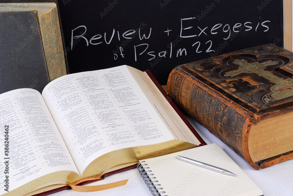 Obraz premium Working on scripture assignment with large bibles