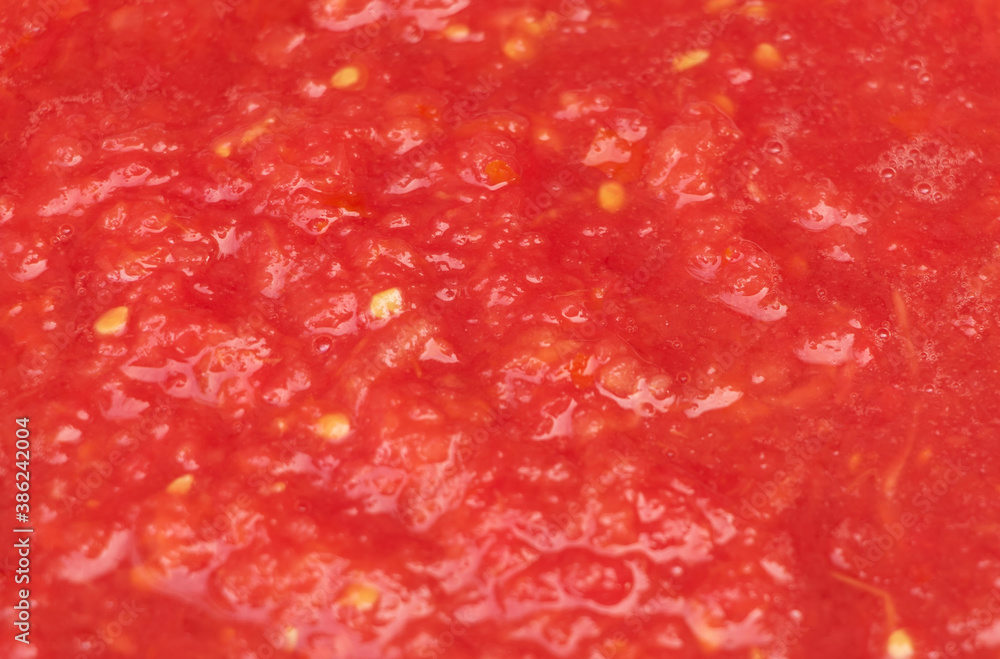 Raw tomato juice texture, in process of cooking Raw tomato juice texture, in process of cooking
