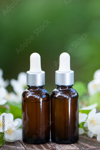 Essential Jasmine oil. Bioproduct, organic cosmetics. Perfumery, cosmetology, aromatherapy