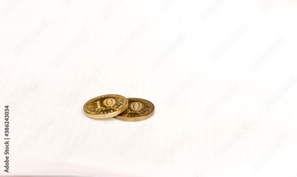 Two Russian coins 10 rubles laying on the white background