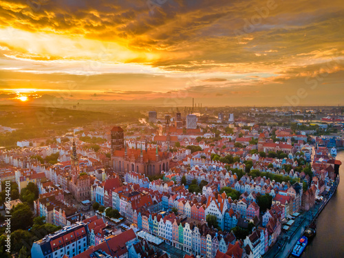 Aerial sunset view of the amazing old town and rivers of Gdansk with ships