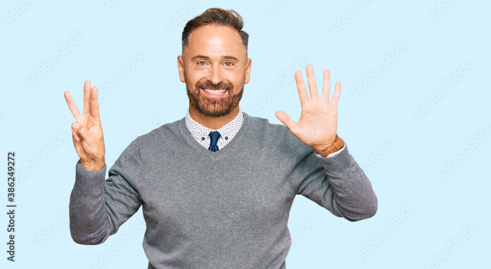 Handsome middle age man wearing business clothes showing and pointing up with fingers number eight while smiling confident and happy. Handsome middle age man wearing business clothes showing and pointing up with fingers number eight while smiling confident and happy.