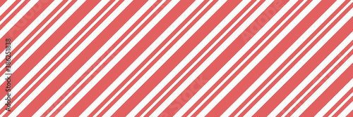 Vector Christmas background with diagonal stripes pattern, candy cane. Long horizontal banner.