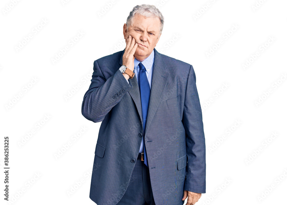 Senior grey-haired man wearing business jacket touching mouth with hand with painful expression because of toothache or dental illness on teeth. dentist Senior grey-haired man wearing business jacket touching mouth with hand with painful expression because of toothache or dental illness on teeth. dentist