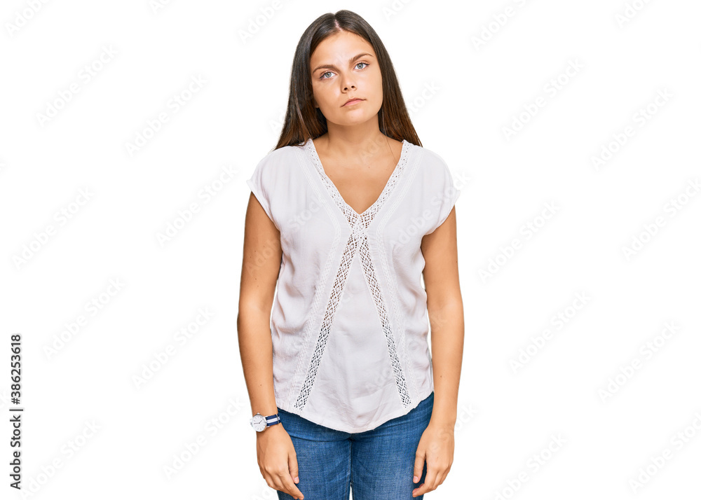 Obraz premium Young caucasian woman wearing casual clothes relaxed with serious expression on face. simple and natural looking at the camera.