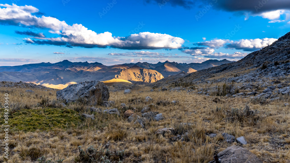 walking at sunset on a hill in the Andes of Peru near of santa barabara town walking at sunset on a hill in the Andes of Peru near of santa barabara town