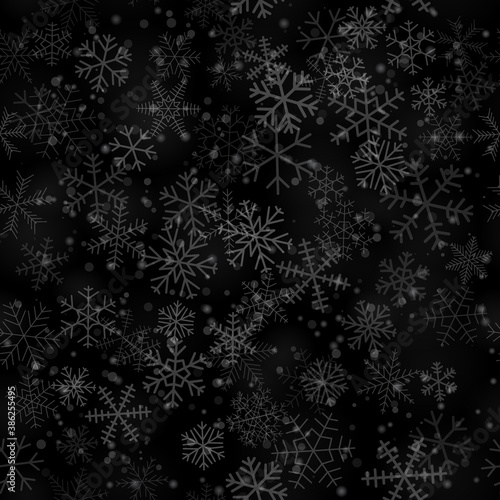 Christmas seamless pattern of snowflakes of different shapes  sizes and transparency  on black background