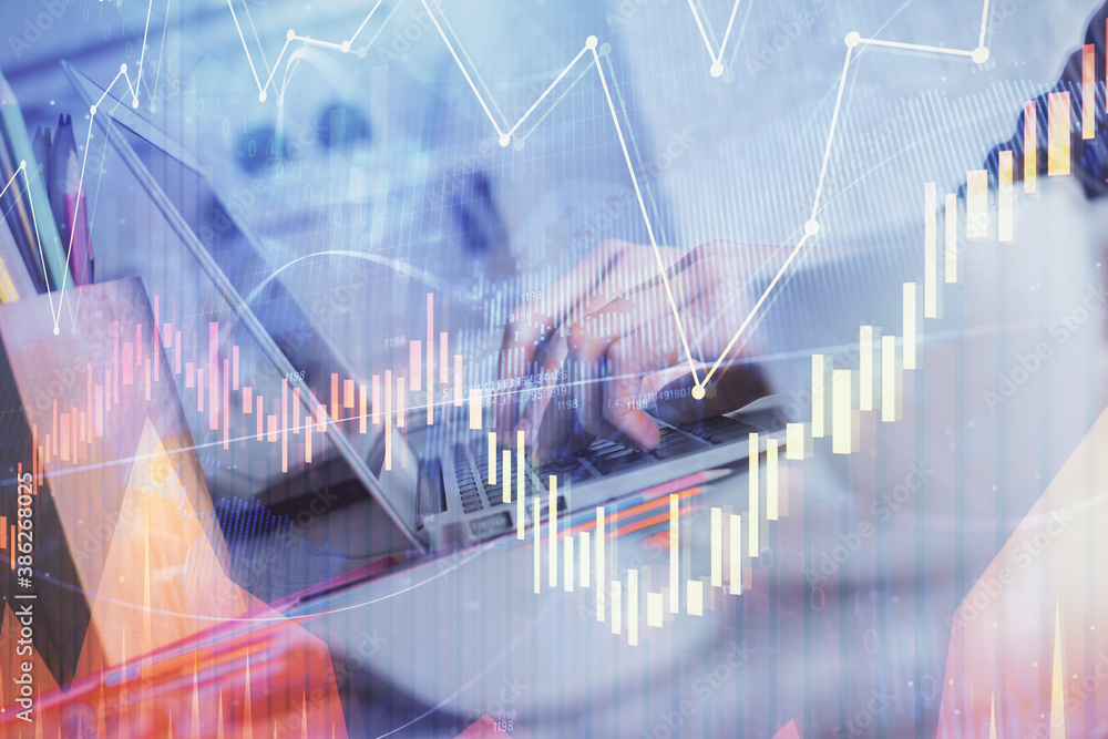 Double exposure of woman hands typing on computer and forex chart hologram drawing. Stock market invest concept. Double exposure of woman hands typing on computer and forex chart hologram drawing. Stock market invest concept.