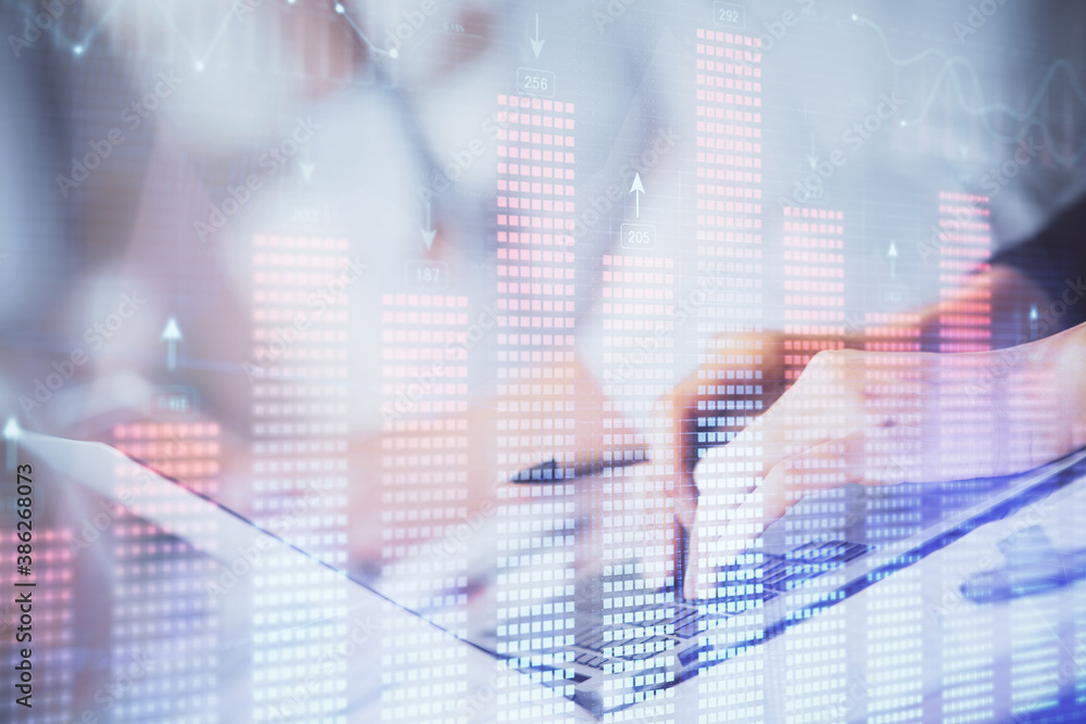 Double exposure of woman hands typing on computer and forex chart hologram drawing. Stock market invest concept. Double exposure of woman hands typing on computer and forex chart hologram drawing. Stock market invest concept.