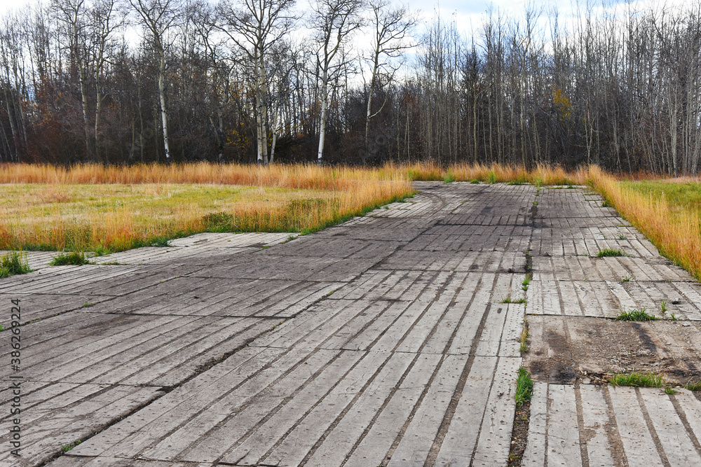 An image of wooden swamp mats used to create temporary road access and preserve the environment