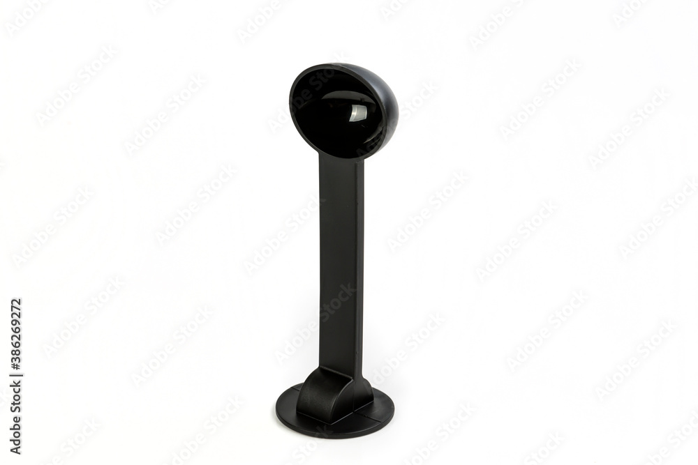 Black plastic coffee ground tamper and scoop standing on end Black plastic coffee ground tamper and scoop standing on end
